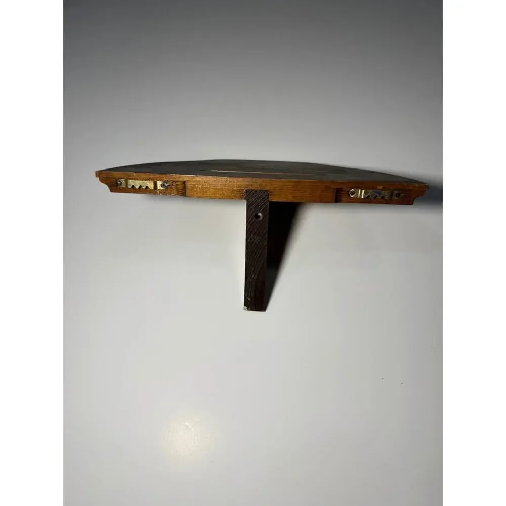 Small dark wood wall shelf